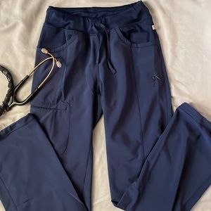 Cherokee Infinity women’s scrub pant. Stylish and cute! Navy blue, size XS.